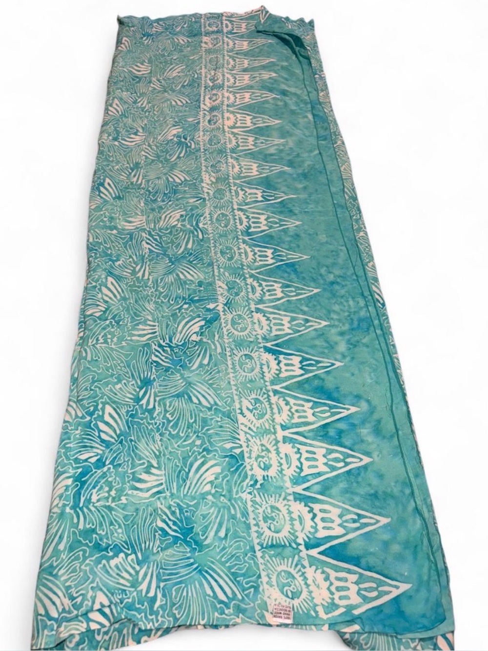 Large lightweight teal beach blanket with sun print pattern